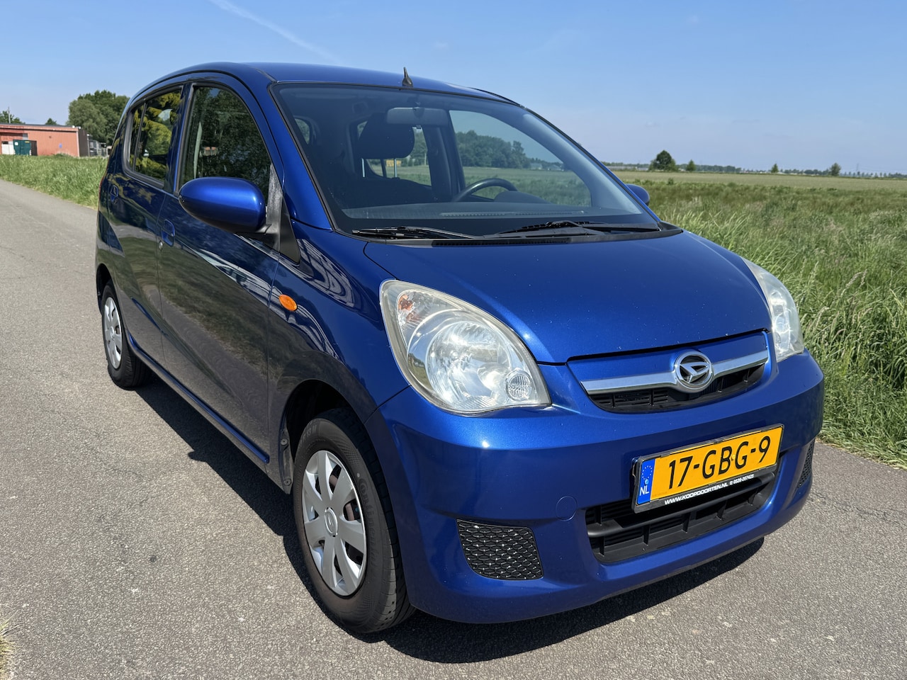 Daihatsu Cuore - 1.0 Premium ELK.RAAM/CV/ APK 06-2026! - AutoWereld.nl