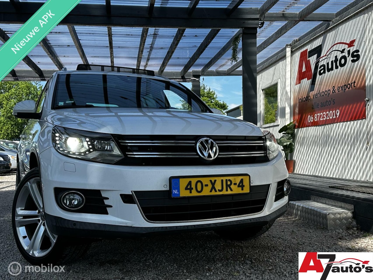 Volkswagen Tiguan - 1.4 TSI Sport&Style Nieuwe APK/Pano/Leder - AutoWereld.nl