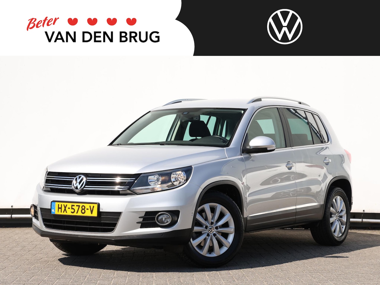 Volkswagen Tiguan - 1.4 TSI Sport&Style 125pk | Dealer onderhouden | Eerste eigenaar | Navigatie | Trekhaak | - AutoWereld.nl