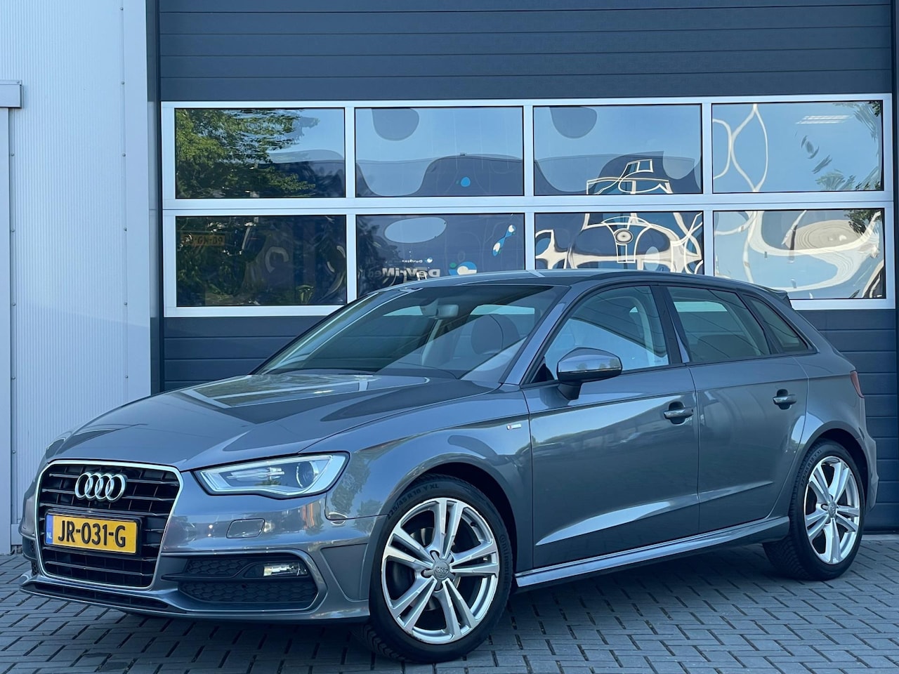 Audi A3 Sportback - 1.2 TFSI Ambition | S-line | Xenon | Navi | PDC | Climate control | Cruise control - AutoWereld.nl