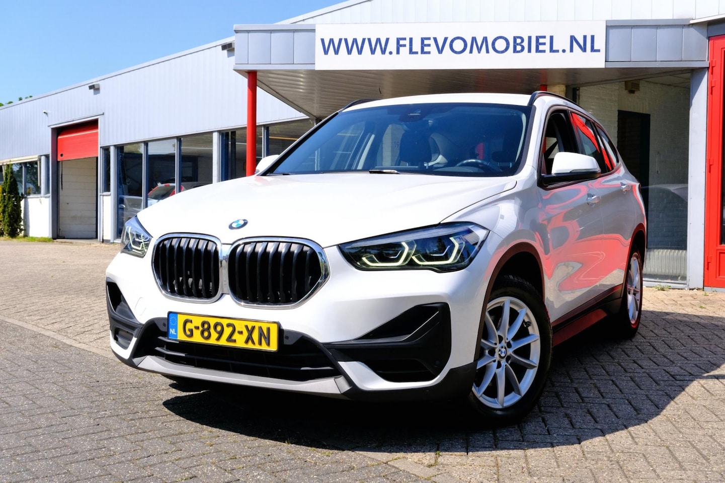 BMW X1 - SDrive18i 140pk Executive Edition Aut. Navi|1e Eig|Clima|Cam|LMV - AutoWereld.nl
