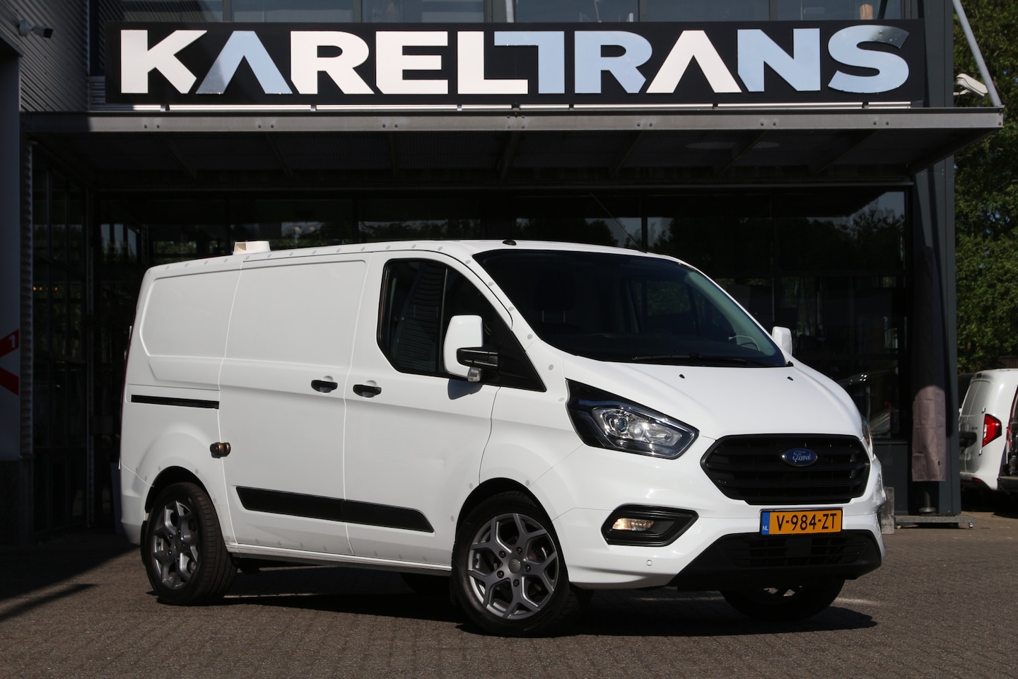Ford Transit Custom - 2.0 TDCI | 2x Schuifdeur | Inrichting | Camera | Cruise | Airco.. - AutoWereld.nl