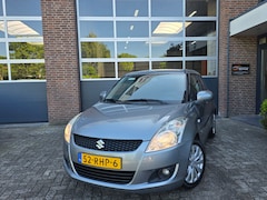 Suzuki Swift - 1.2 Exclusive EASSS|Cruise|Lm Velgen|Clima|Trekhaak|Stoelverwarming