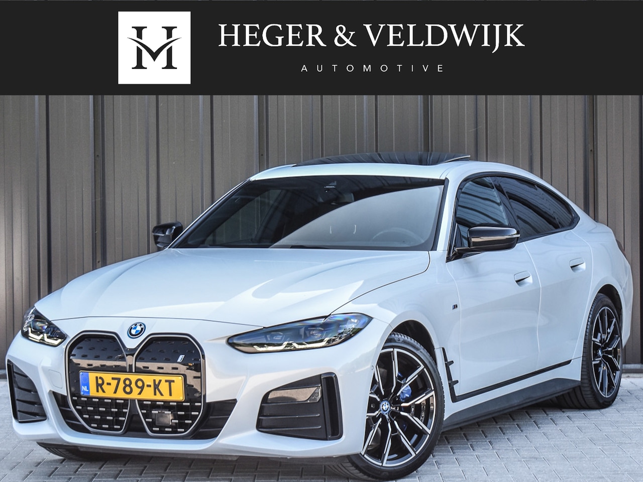 BMW i4 - eDrive40 High EXECUTIVE 84 kWh | M-SPORT | SCHUIFDAK | SHADOW-LINE | NL- AUTO | CAMERA | H - AutoWereld.nl