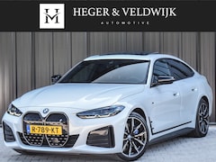 BMW i4 - eDrive40 High EXECUTIVE 84 kWh | M-SPORT | SCHUIFDAK | SHADOW-LINE | NL- AUTO | CAMERA | H