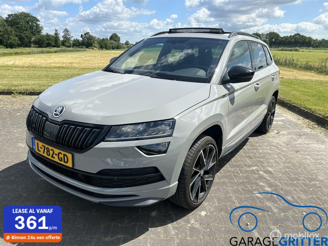 Skoda Karoq - 1.5 TSI ACT Sportline Business 1.5 TSI ACT Sportline Business - AutoWereld.nl