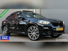 BMW X4 - xDrive20i High Executive M-Sport Pano.dak/H&K/Leder/21"