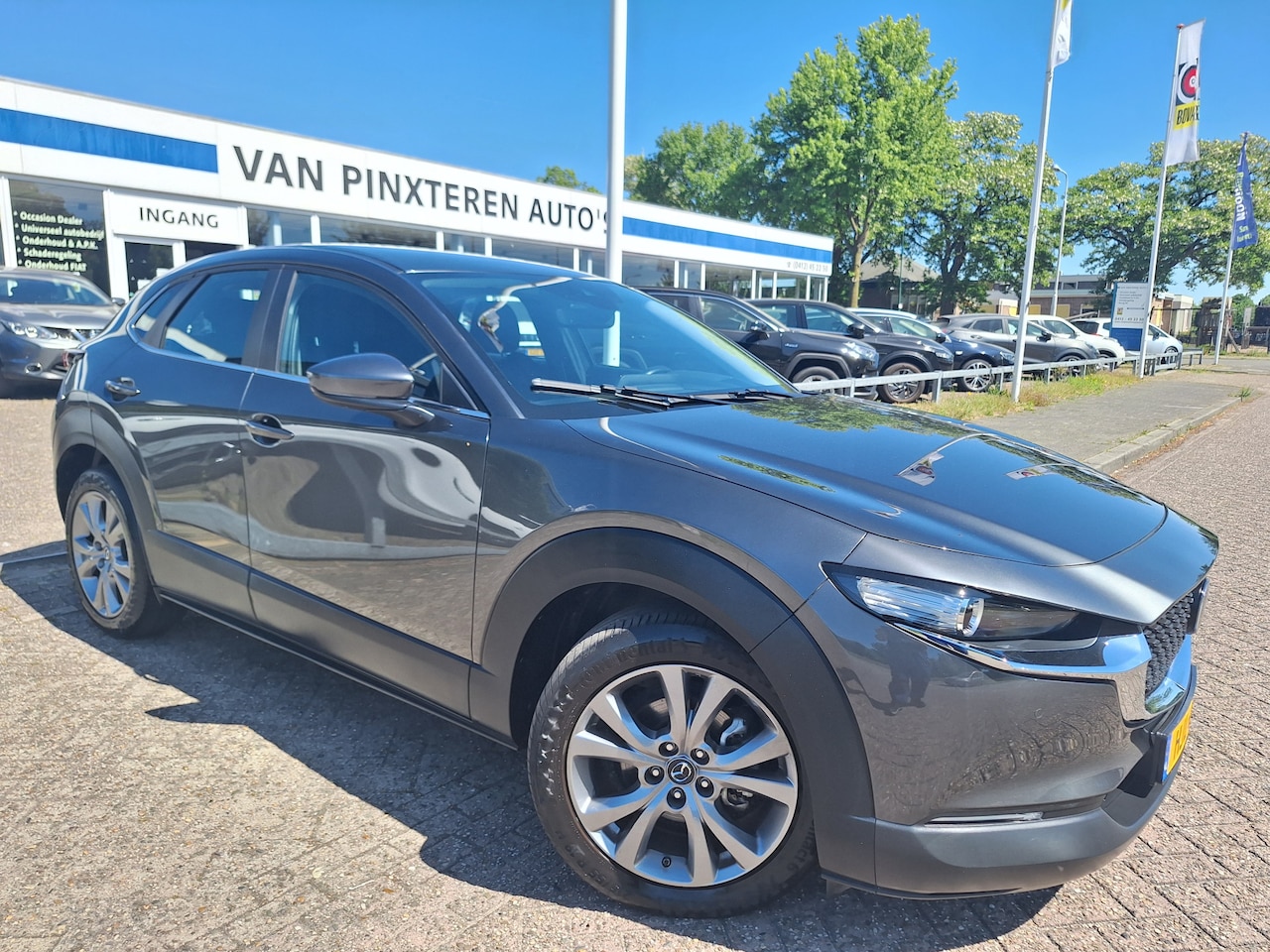 Mazda CX-30 - 2.0 e-SkyActiv-G M Hybrid NAVI/360 CAMERA/STUUR+STOEL VERWARMING - AutoWereld.nl