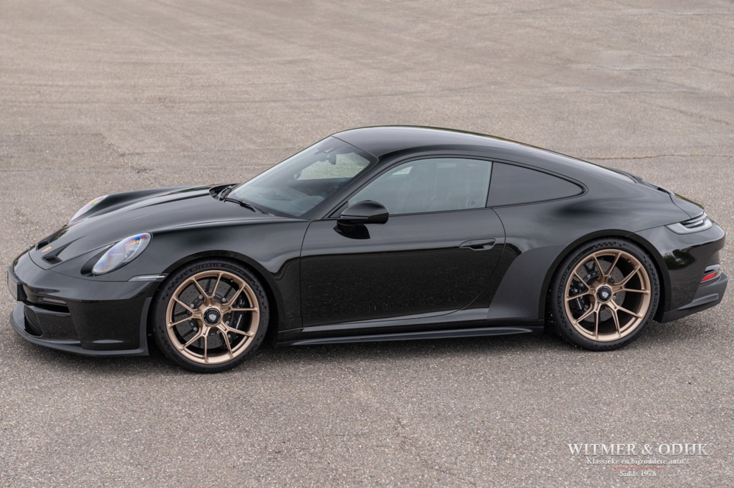 Porsche 911 - 4.0 GT3 Touring Dark Olive Met. 8.000km - AutoWereld.nl