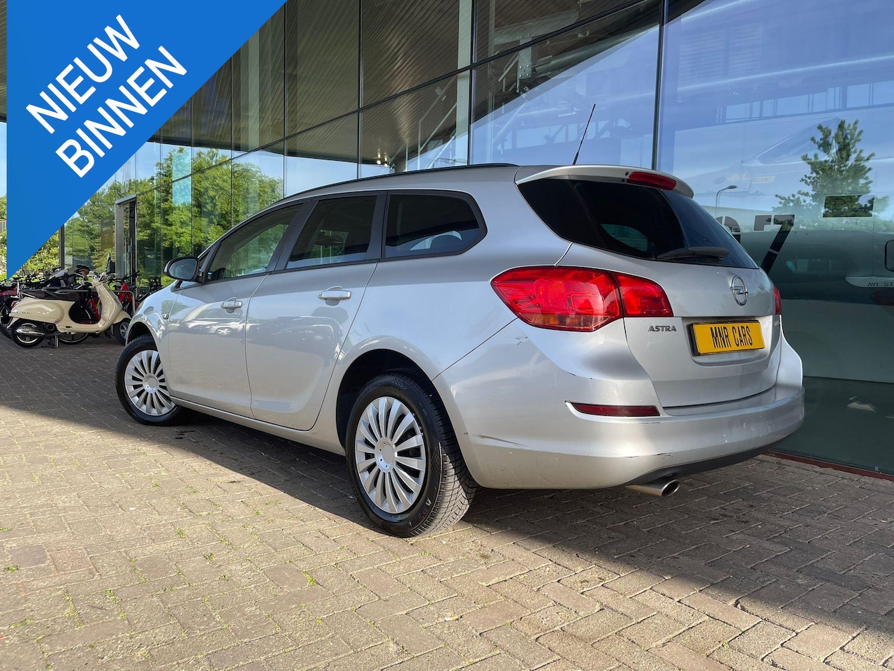 Opel Astra Sports Tourer - 1.4 Turbo Edition CRUISE-AIRCO- - AutoWereld.nl