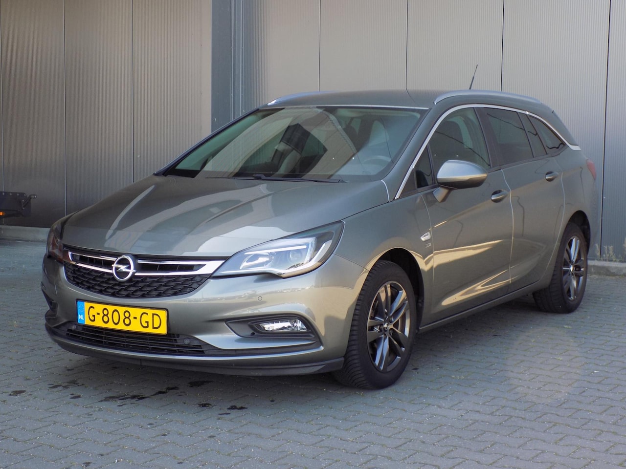 Opel Astra Sports Tourer - 1.0 Turbo 120 Jaar Edition 1.0 Turbo 120 Jaar Edition - AutoWereld.nl