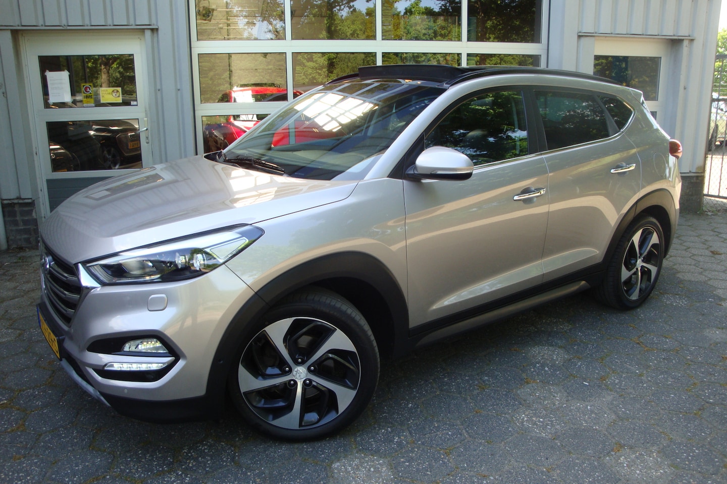Hyundai Tucson - 1.6 T-GDi Premium 4WD / Panorama dak (open) - AutoWereld.nl