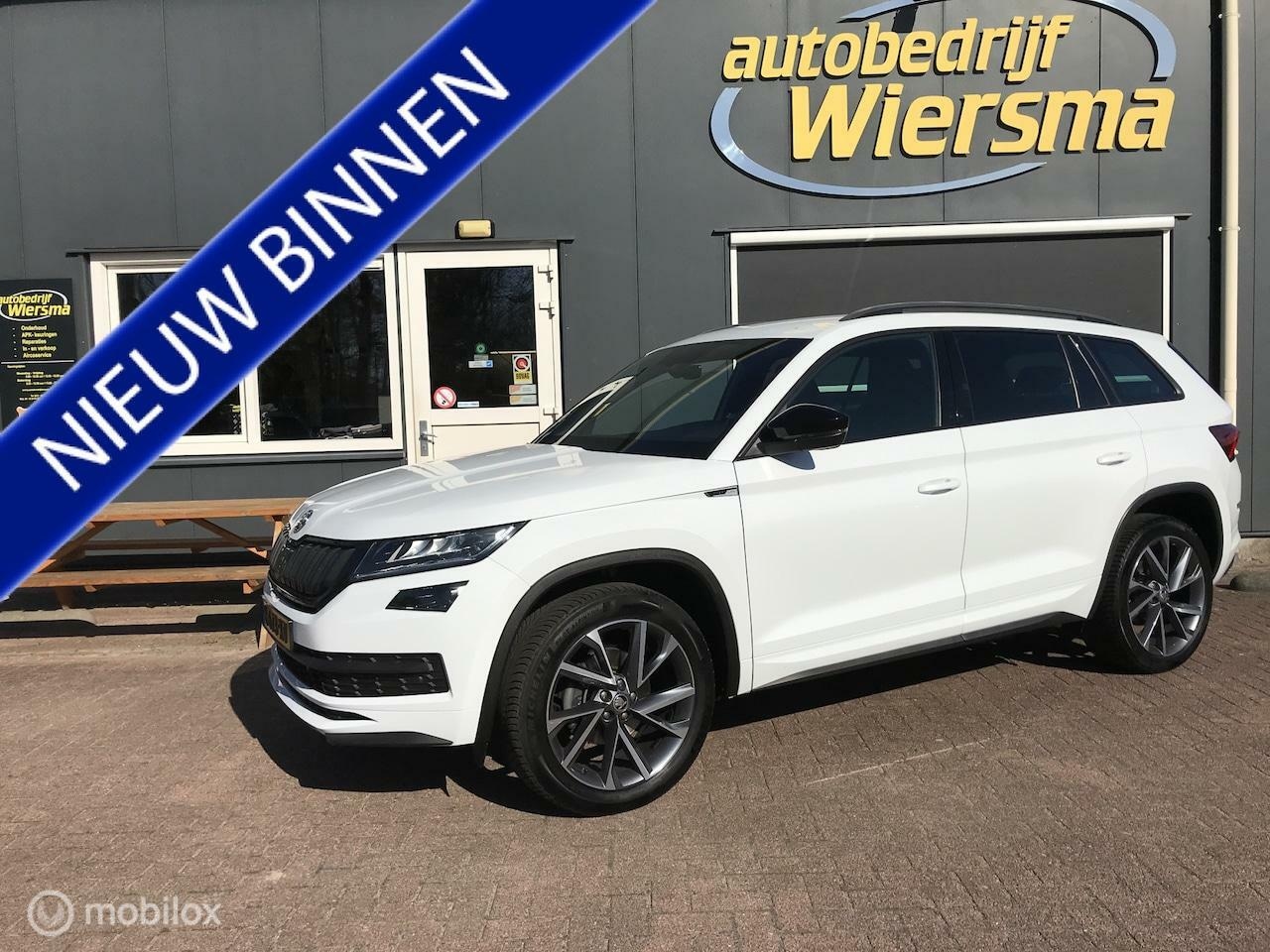 Skoda Kodiaq - 1.5 TSI Sportline Business Super mooie uitstraling Wegklapbare trekhaak camera - AutoWereld.nl