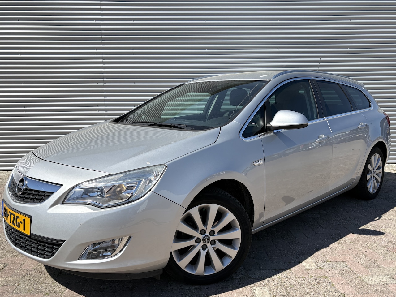 Opel Astra Sports Tourer - 1.4 Turbo Cosmo | Nieuw Binnen | Bluetooth | Cruise | Airco - AutoWereld.nl