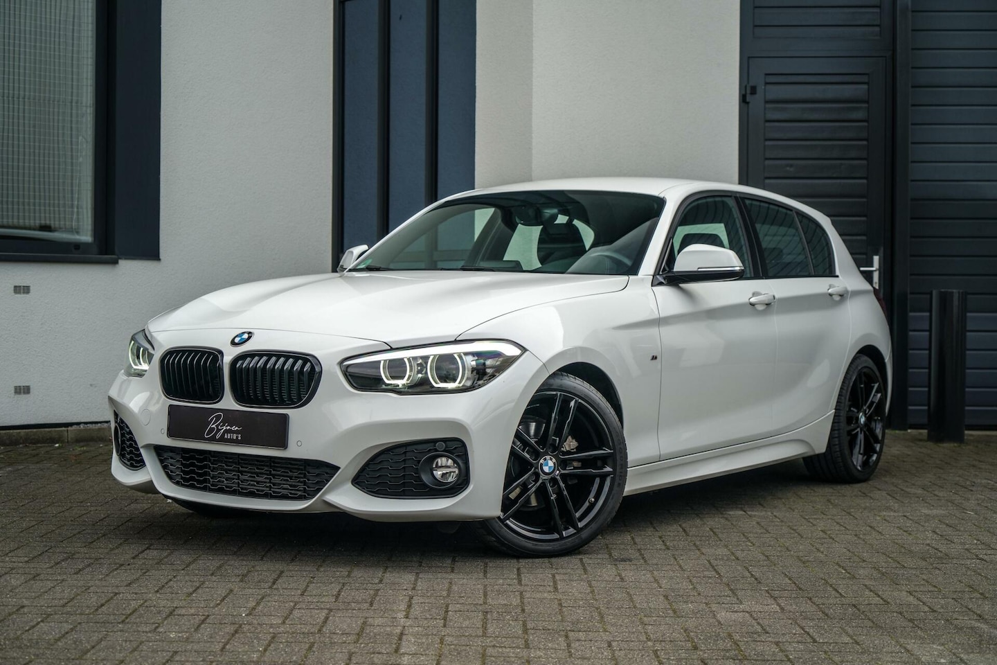 BMW 1-serie - 118i Edition M Sport Harman Kardon / NAVI / LEER - AutoWereld.nl