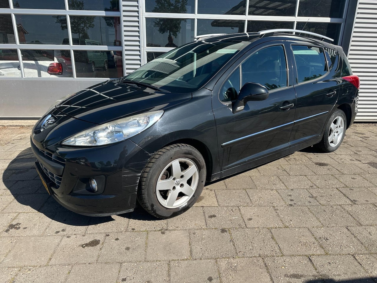 Peugeot 207 SW - 1.4 VTi Blue Lease Executive - Airco - Cruise Control - AutoWereld.nl