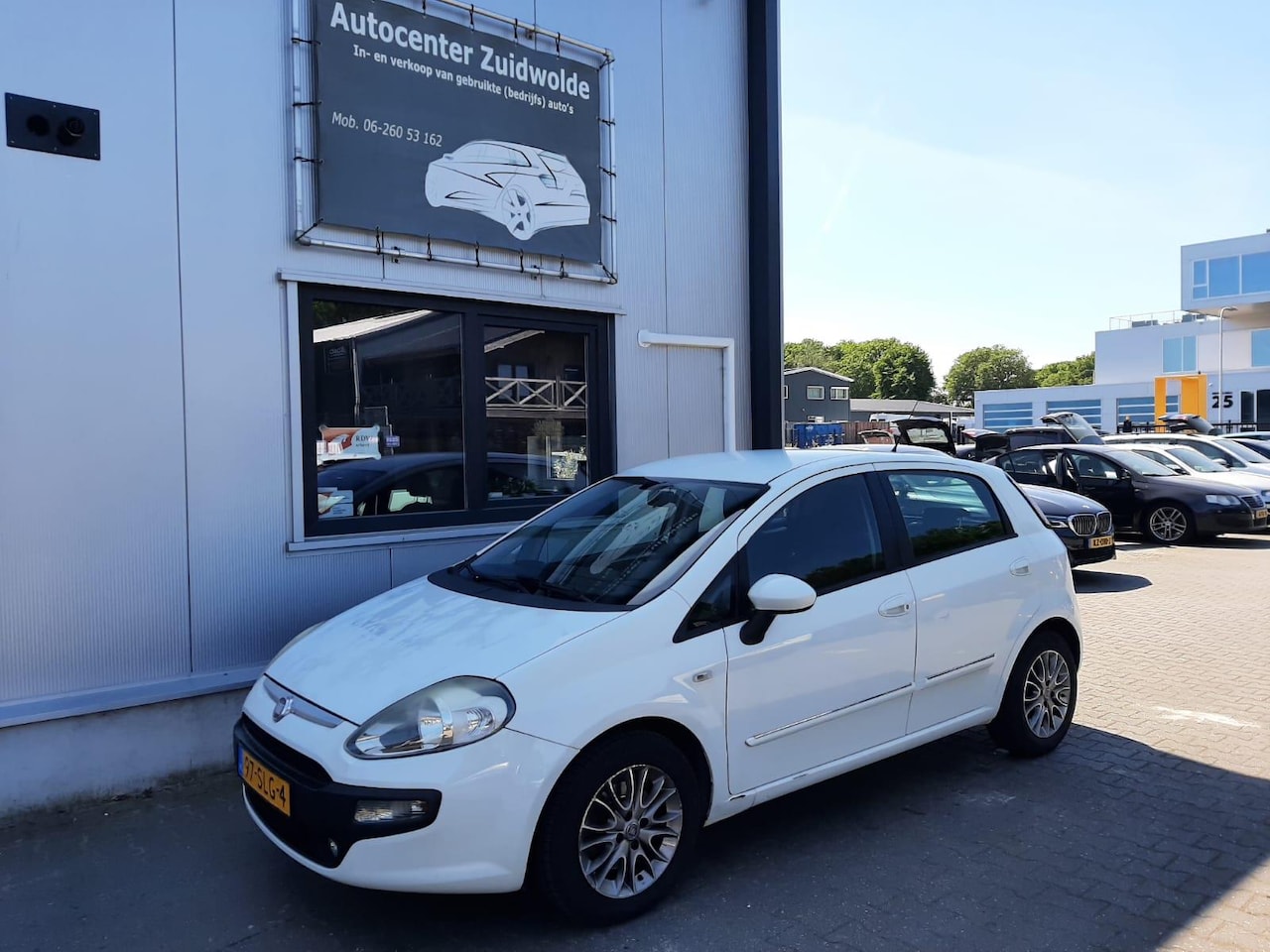 Fiat Punto Evo - 1.3 M-Jet Dynamic clima cruise lmv - AutoWereld.nl