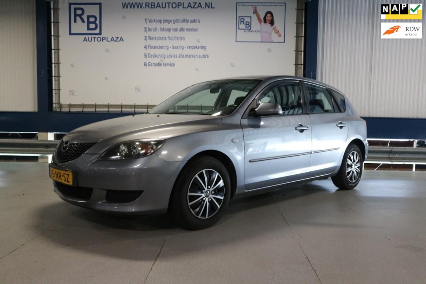 Mazda 3 Sport - 1.4 Exclusive 2e EIG / NAP / AIRCO / APK 2026 ! ! ! - AutoWereld.nl