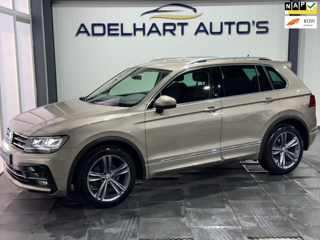 Volkswagen Tiguan - 1.4 TSI Sound R-Line 150 PK / Full map navigatie / Cruise control / Climate control / Stoe - AutoWereld.nl