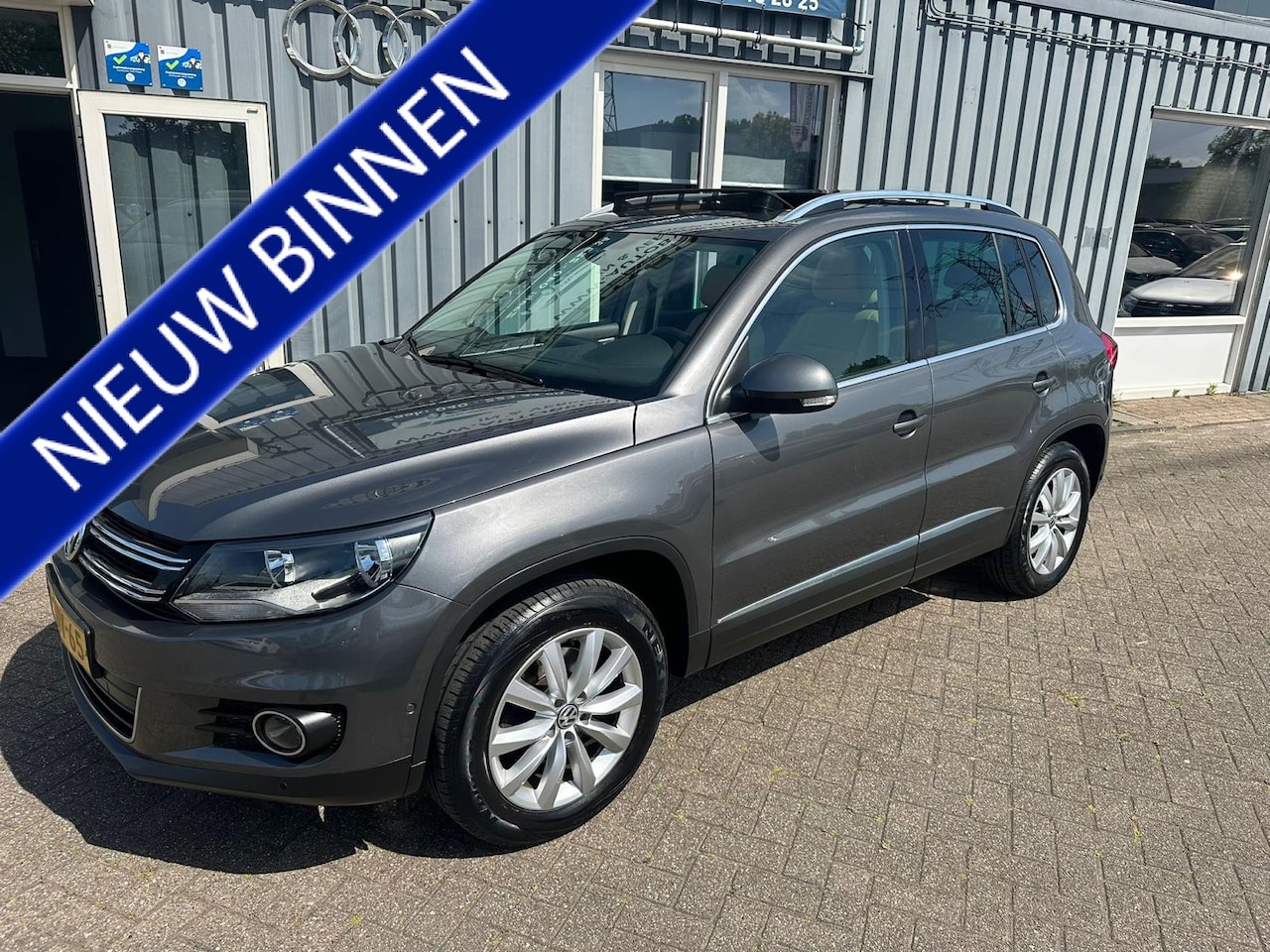 Volkswagen Tiguan - 1.4 TSI Sport&Style - AutoWereld.nl