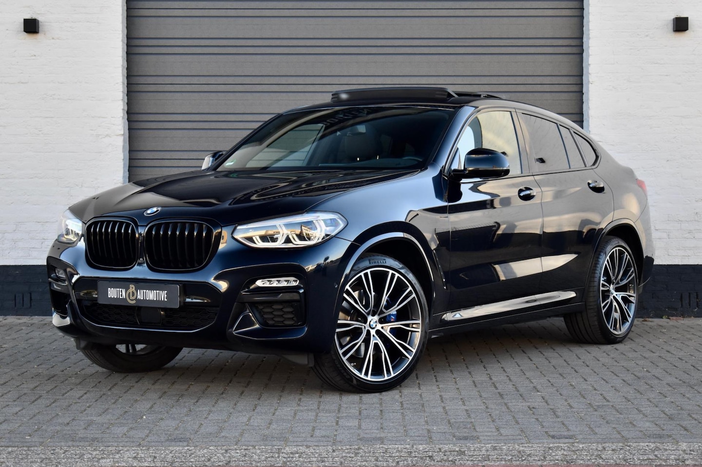 BMW X4 - M40i High Executive | Pano | ACC | 360° cam | Headup | H&K | Trekhaak | - AutoWereld.nl