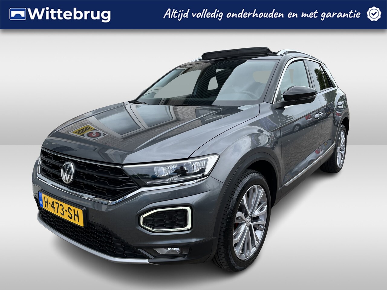 Volkswagen T-Roc - 1.5 TSI Sport / AUTOMAAT/ PANO/ TREKHAAK/ CAMERA/ PARK. SENSOREN V+A/ CAMERA/ STOEL VERWAR - AutoWereld.nl