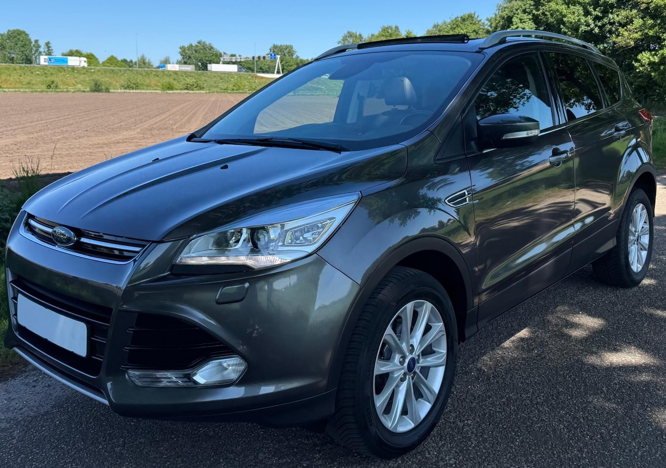 Ford Kuga - 1.5 Titanium 2016 150PK NAVI PANO CLIMA NAVI CRUISE TREKHAAK - AutoWereld.nl