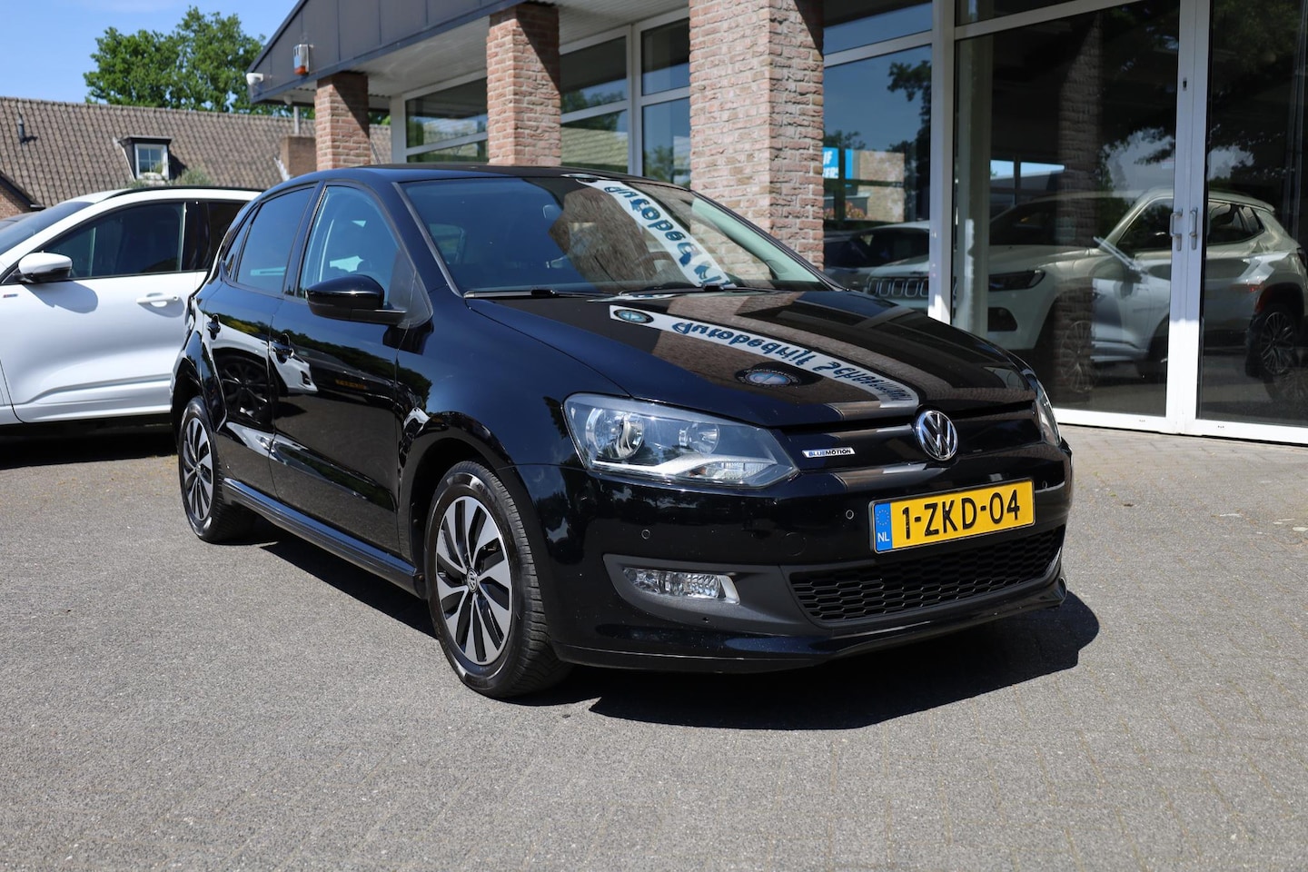Volkswagen Polo - 1.4 TDI BlueMotion 5-DRS NAVI CRUISE AIRCO LMV NAP 2xPDC VOICE-COMMAND - AutoWereld.nl