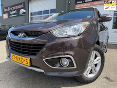 Hyundai ix35 - 2.0i Style van 2de Eigenaar met parkeercamera en trekhaak en airco en bluetooth telefoon