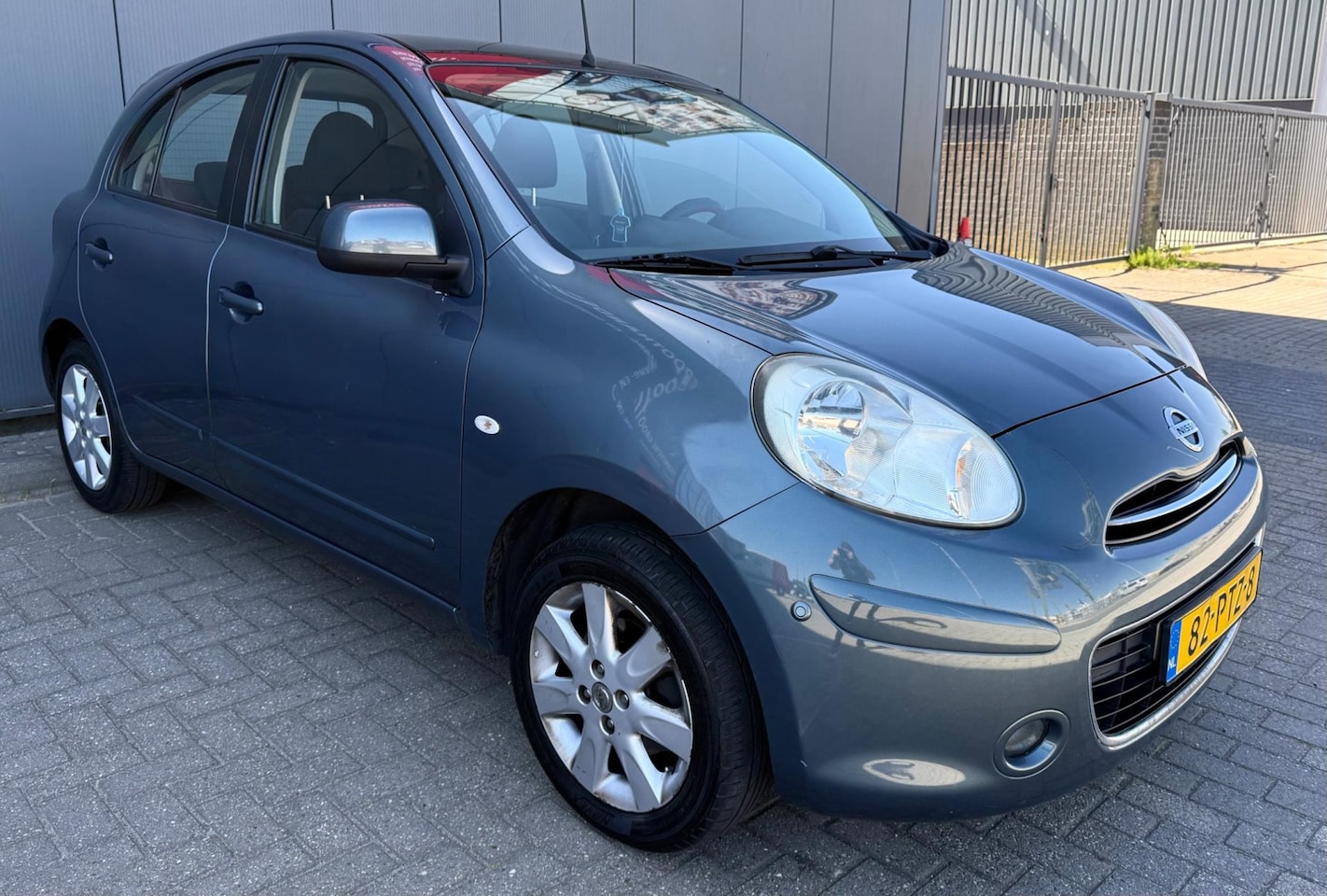 Nissan Micra - 1.2 Tekna PANO/Camera - AutoWereld.nl