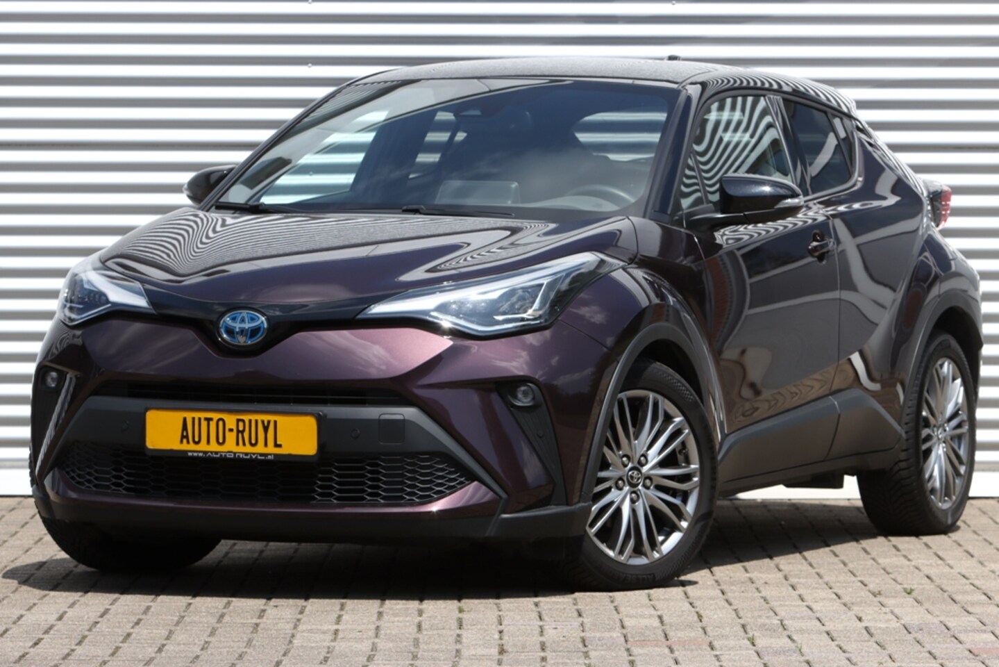 Toyota C-HR - 1.8 Hybrid Style Bi-Tone Carplay / Safety Pakket / Navi - AutoWereld.nl