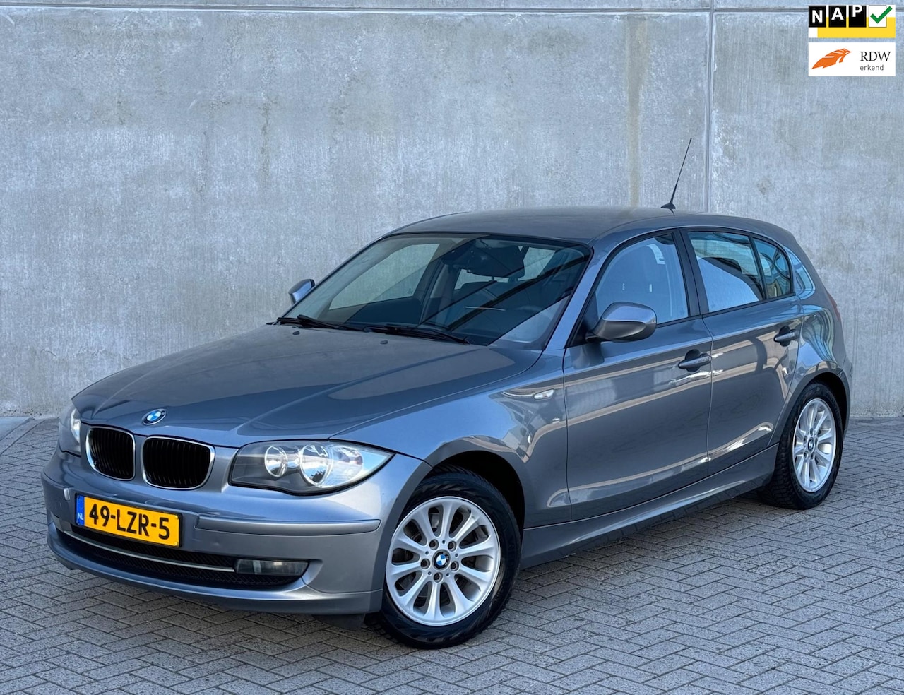 BMW 1-serie - 2.0 118I 5DR 2010 Grijs CLIMA|NAP|NW APK|2E EIG. - AutoWereld.nl