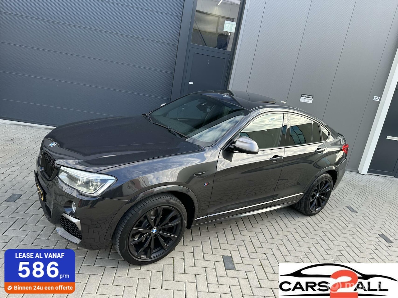 BMW X4 - M40i SCHUIFDAK HEADUP HARMEN / KARDON - AutoWereld.nl