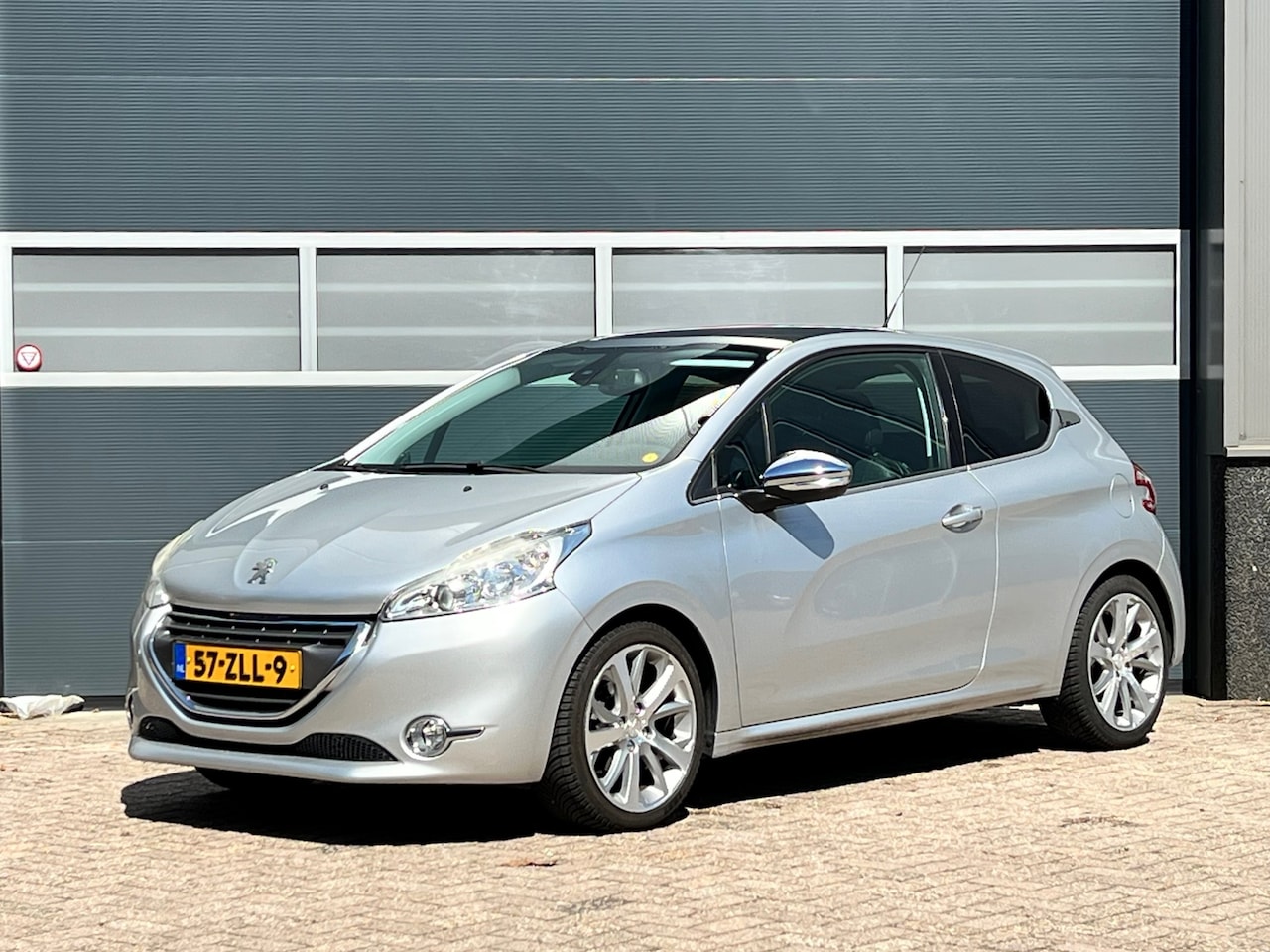 Peugeot 208 - 1.6 VTi Allure bj.2013 Pano|Leder|Navi|Pdc|Nap. - AutoWereld.nl