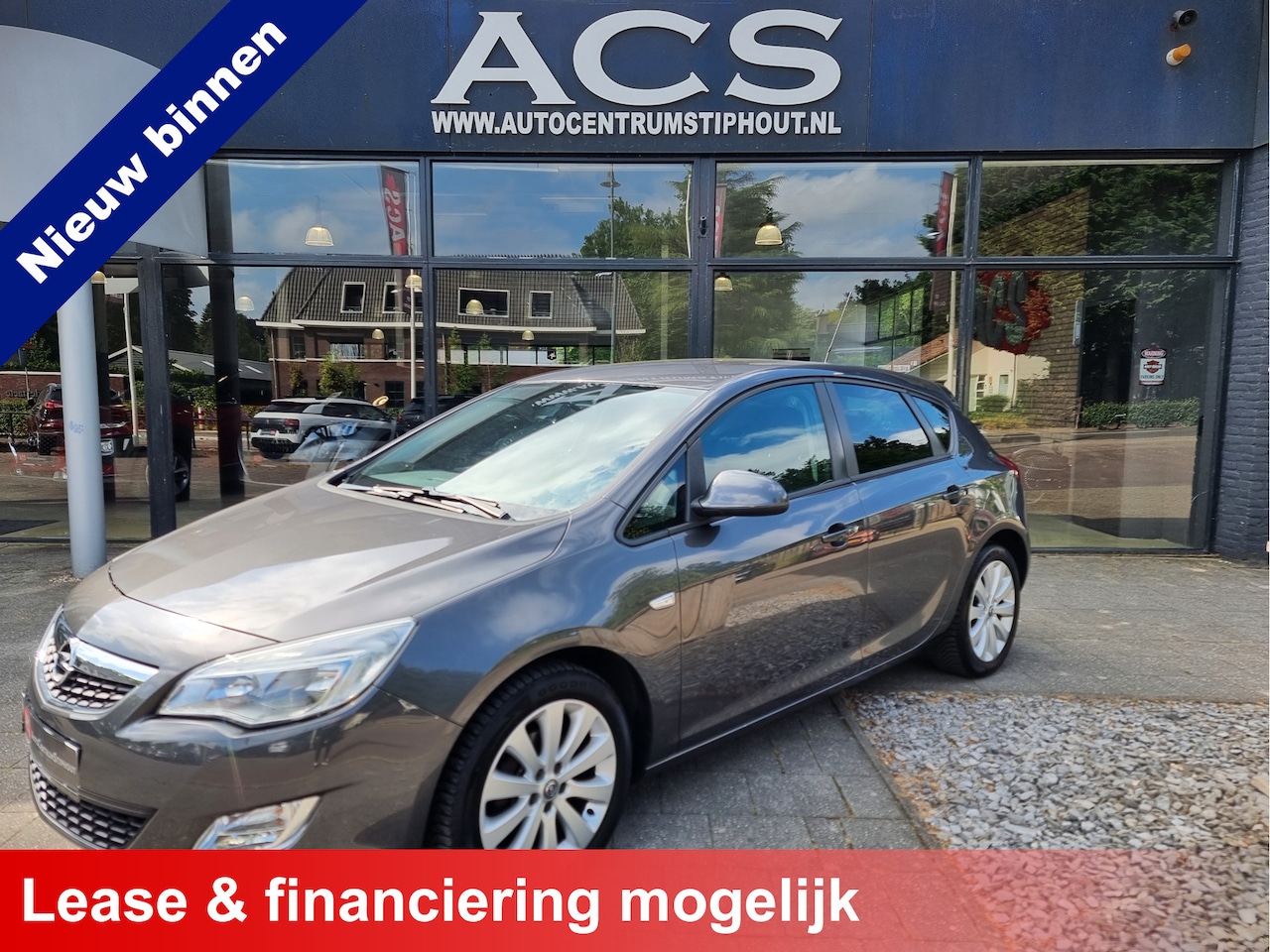 Opel Astra - 1.4 Edition | Airco | Cruise | 125dkm | Afn. trekhaak | Privacy | Zeer nette staat! - AutoWereld.nl