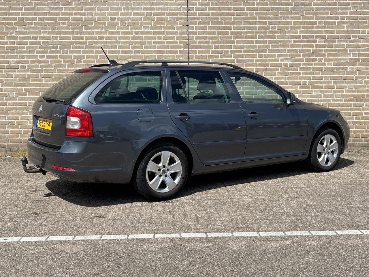 Skoda Octavia Combi - 1.4 TSI Greentech Ambition Business Line | Cruise | Climate | Navi | PDC | Trekhaak | - AutoWereld.nl