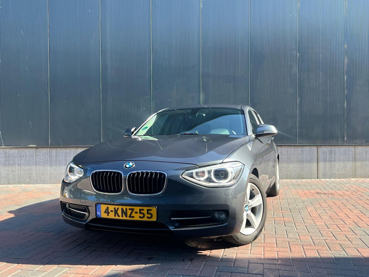 BMW 1-serie - 116i EDE Executive Sport * Cruise * Navi * Led * Goed Onderhouden - AutoWereld.nl