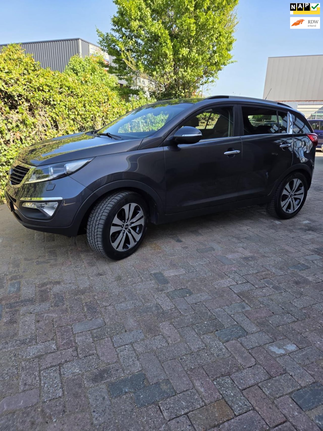 Kia Sportage - 2.0 X-clusive - AUTOMAAT - AutoWereld.nl