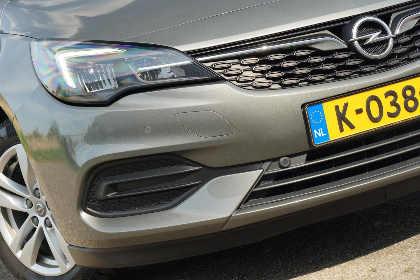 Opel Astra Sports Tourer - 1.2 Edition | Granite Grey | Carplay/Ergo-seats/Trekhaak - Complete auto! - AutoWereld.nl