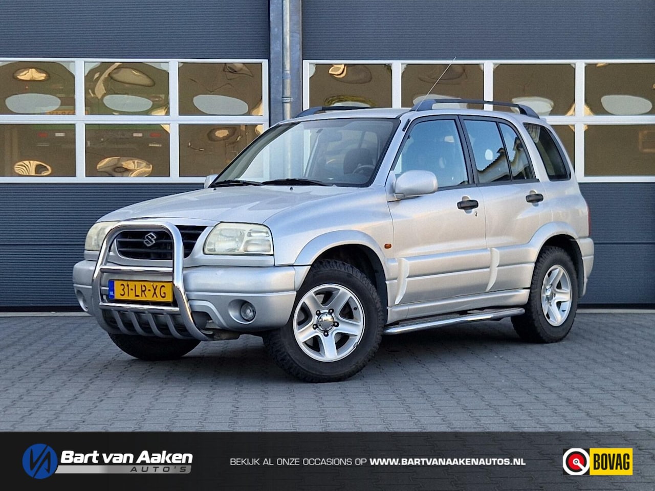 Suzuki Grand Vitara - 2.0 5Drs 5D Airco Nieuwe APK - AutoWereld.nl