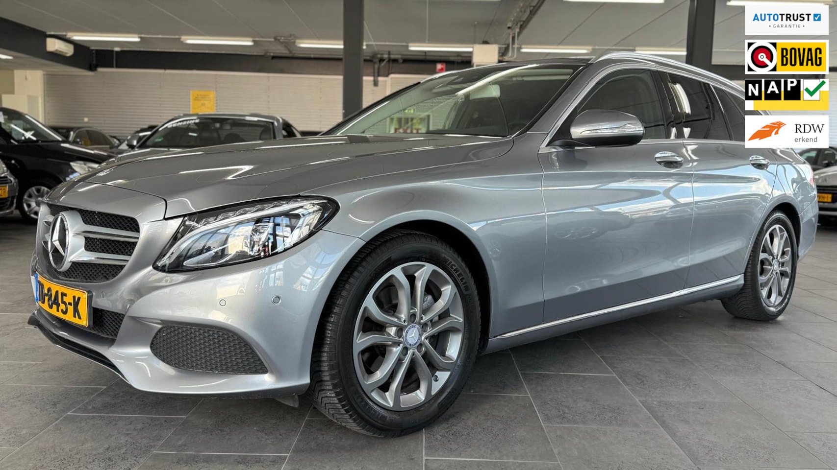 Mercedes-Benz C-klasse Estate - 180 Prestige xenon half leer navi clima cruise controle lm-velgen stoelverwarming pdc deal - AutoWereld.nl