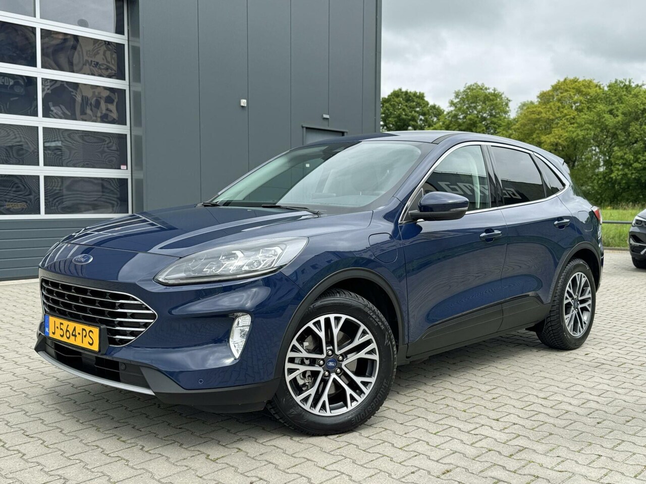 Ford Kuga - 2.5 PHEV Titanium X 2.5 PHEV 165kW Titanium X e-CVT - AutoWereld.nl