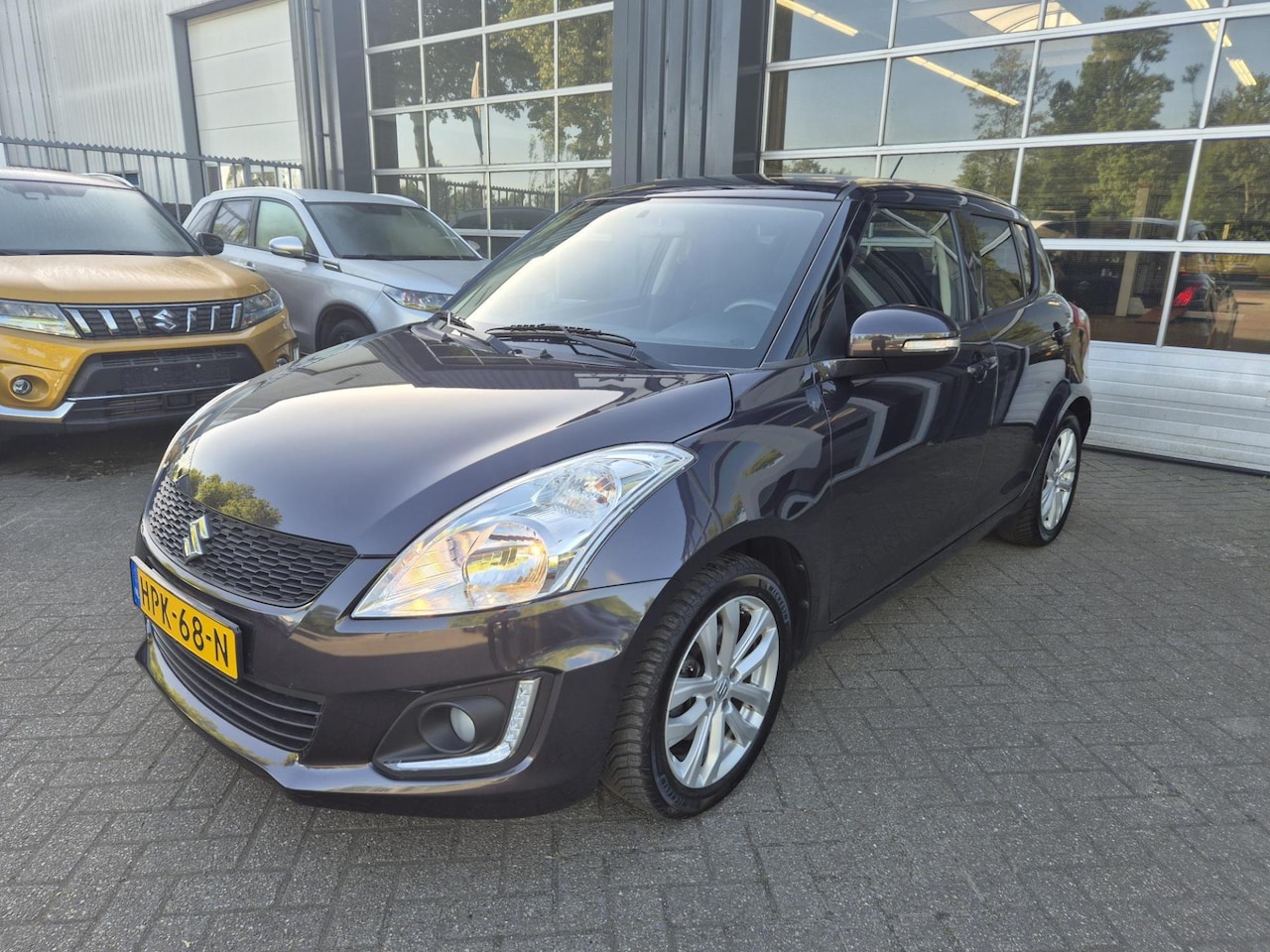 Suzuki Swift - 1.2 Exclusive / Clima / 12 mnd garantie - AutoWereld.nl