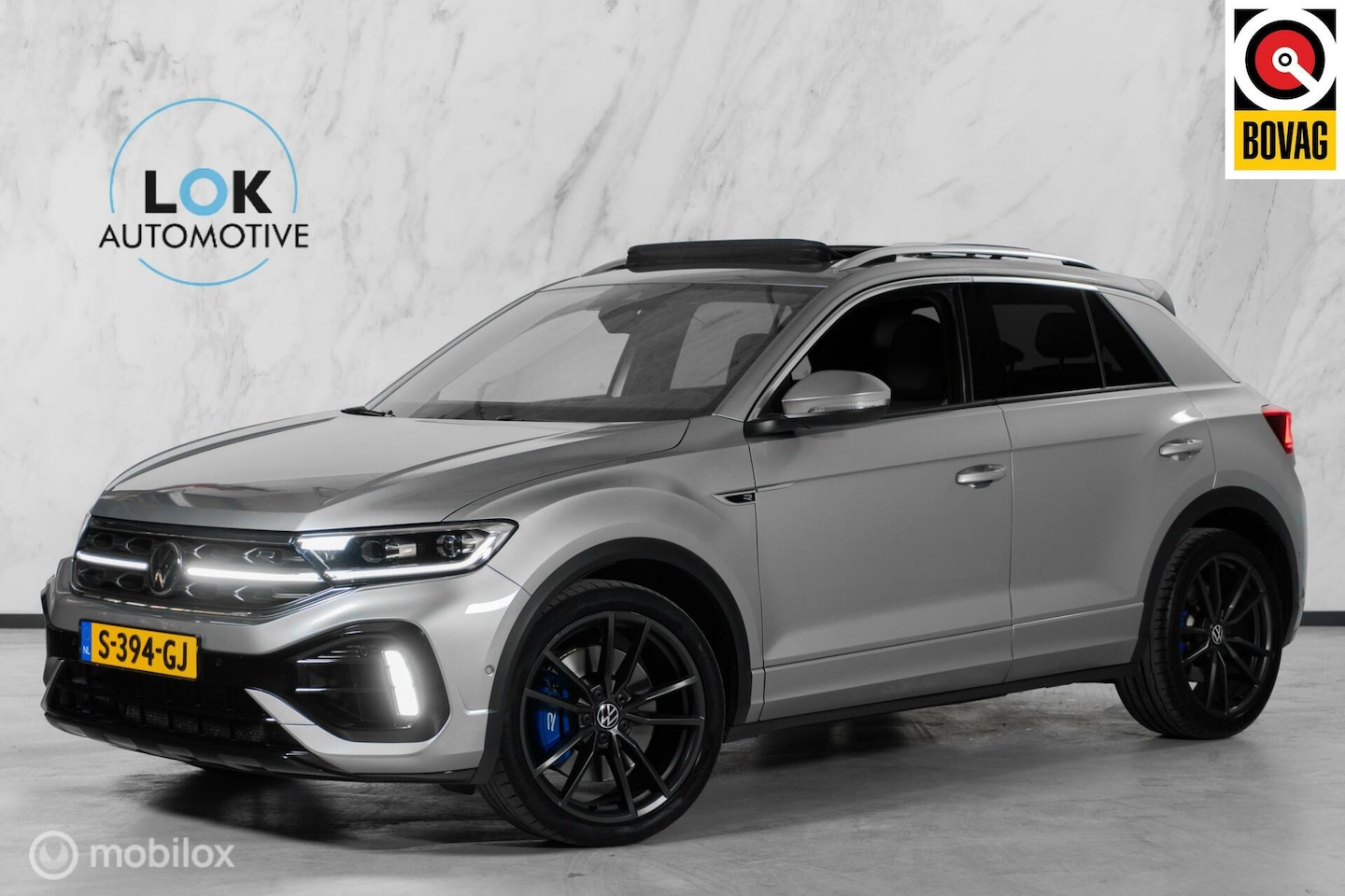 Volkswagen T-Roc - 2.0 TSI 4Motion R|PANO|AKRA|IQ|CAMERA|ACC - AutoWereld.nl