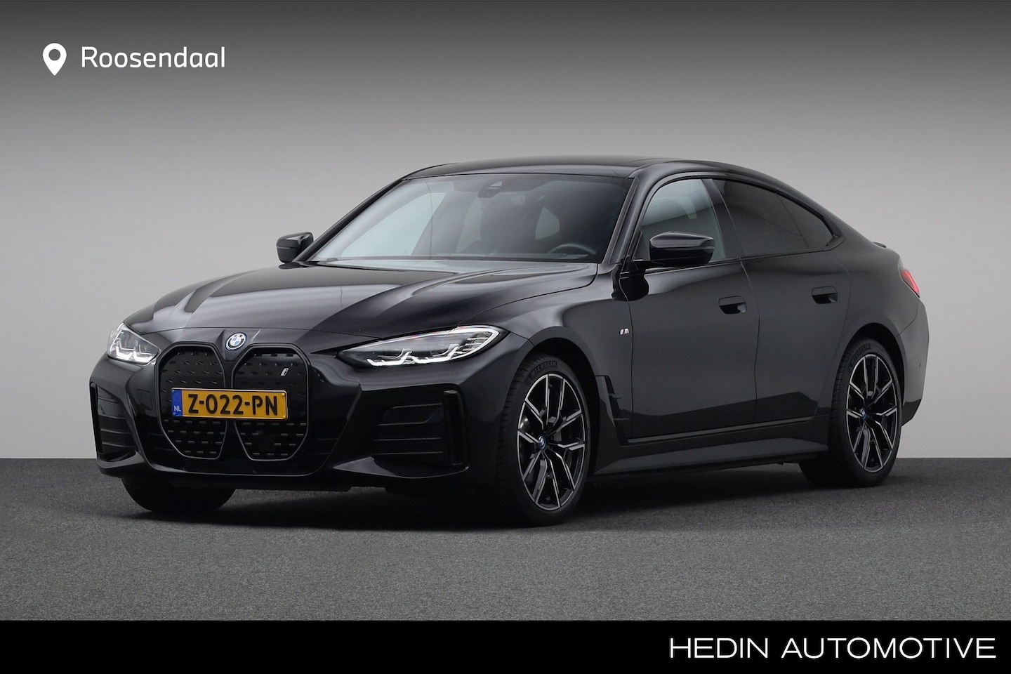 BMW i4 - eDrive40 High Executive 84 kWh M-Sport | Active Cruise Control | Open dak | Hi-Fi | Camera - AutoWereld.nl