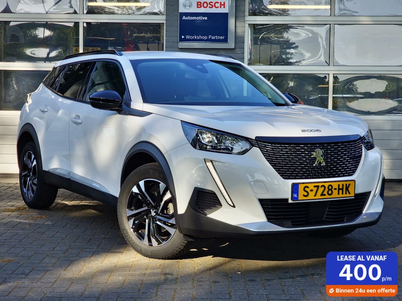 Peugeot 2008 - 1.2 PureTech Allure|Automaat|12.603km|Clima|Navi|Carplay|PDC|17-inch| - AutoWereld.nl