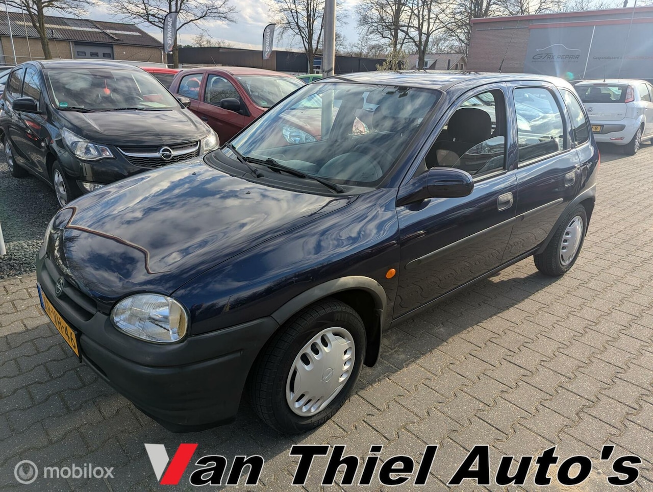 Opel Corsa - 1.2i-16V Strada vol automaat stuurbekrachtiging - AutoWereld.nl