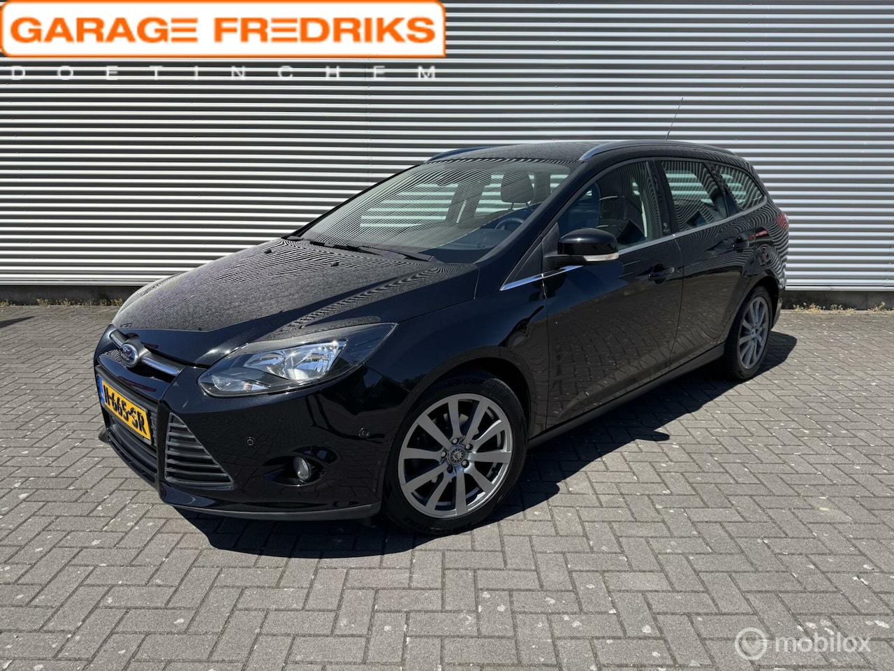 Ford Focus Wagon - 1.0 EcoBoost Titanium | Stoelverwarming | Navigatie | - AutoWereld.nl