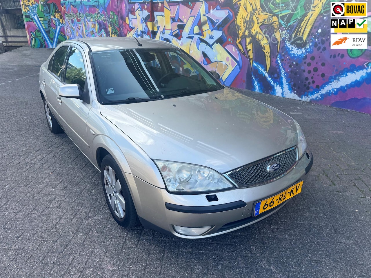 Ford Mondeo - 2.0-16V Futura automaat navigatie digitale airco voorraam verwarming inklapbare spiegels a - AutoWereld.nl