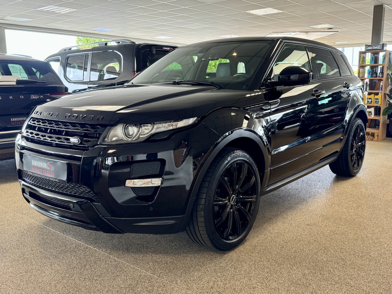 Land Rover Range Rover Evoque - 2.0 Si 4WD Prestige Camera, Clima, Telefoon, Leder, 20Inch, Xenon! - AutoWereld.nl